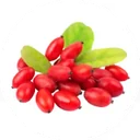 Red goji berries, shiny, resting on a few of their own leaves